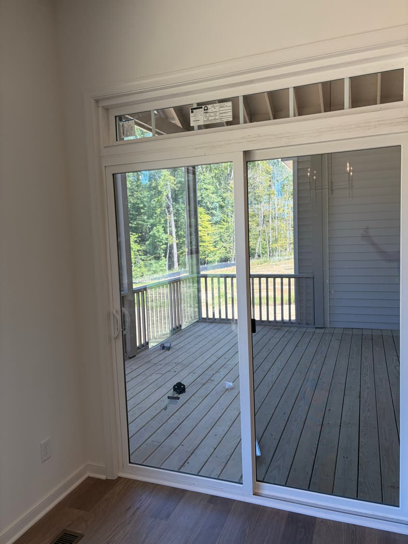 Sliding glass door with clean glass and floors
